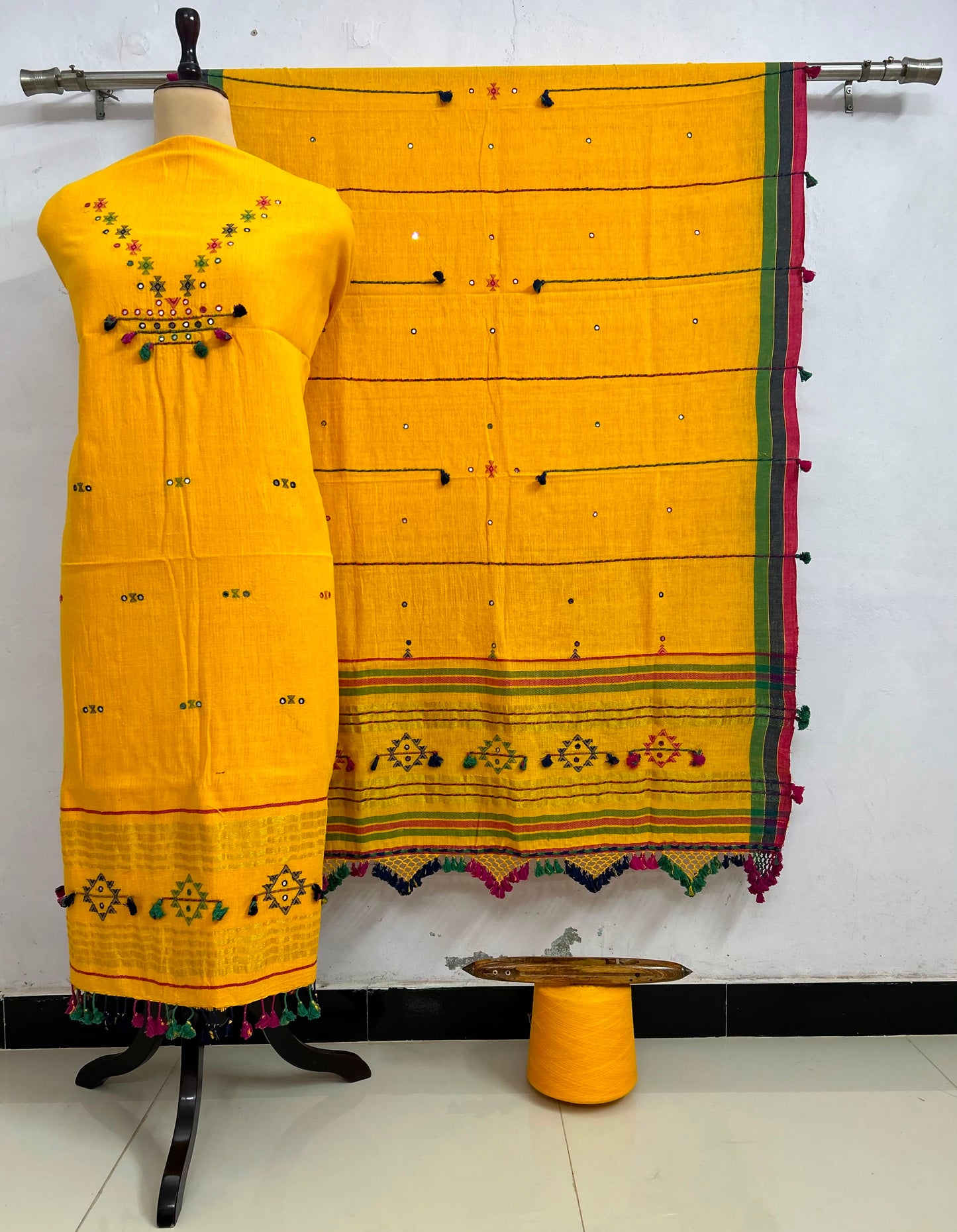 Fumka - handwoven Kapas Bhujodi 3 piece suit set with intricate mirror detailing, artisan woven kurta, matching bottoms and dupatta by Rihyaaz in sustainable handcrafted ethnic wear.