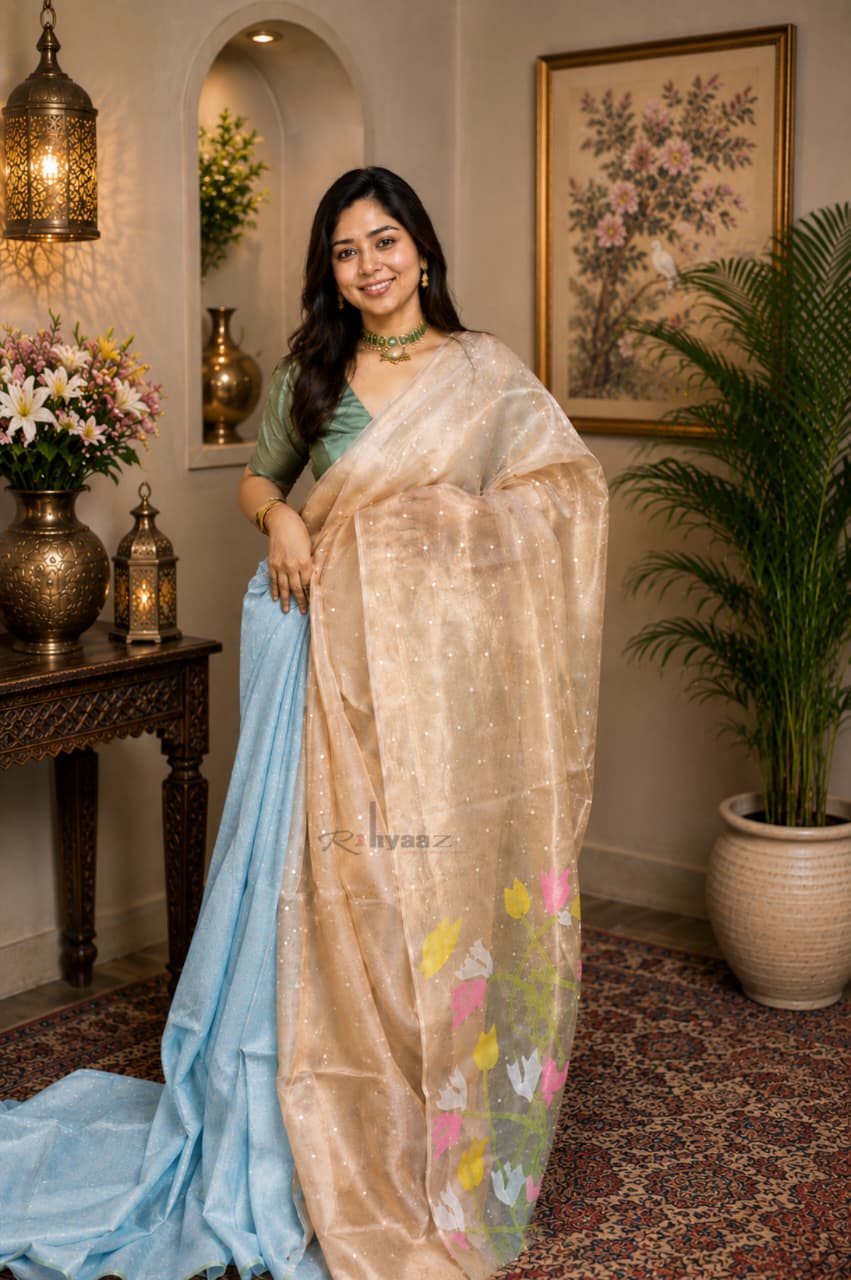 Qala tissue silk sequin weaved saree with intricate Jamdani palla and solid-colour blouse piece, customisable in pastel shades by Rihyaaz.