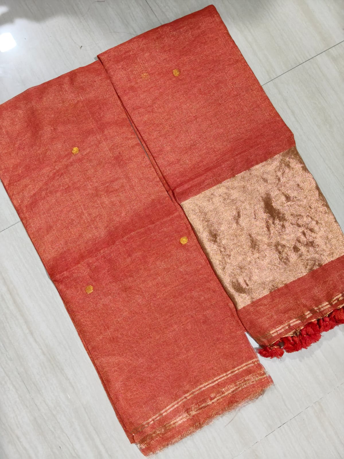 Premium silk tissue linen suit set with broad zari palla dupatta in elegant festive ethnic wear for women.
