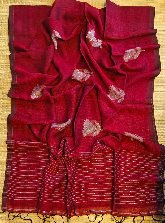 Shri Pure Linen by Linen handwoven floral motif Jamdani saree with sequence work on motifs and pallu, needlework butta and check blouse piece by Rihyaaz.