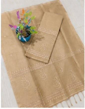 Kairi beige Pure Silk Linen Jamdani suit with handwoven detailing and net tassel dupatta by Rihyaaz