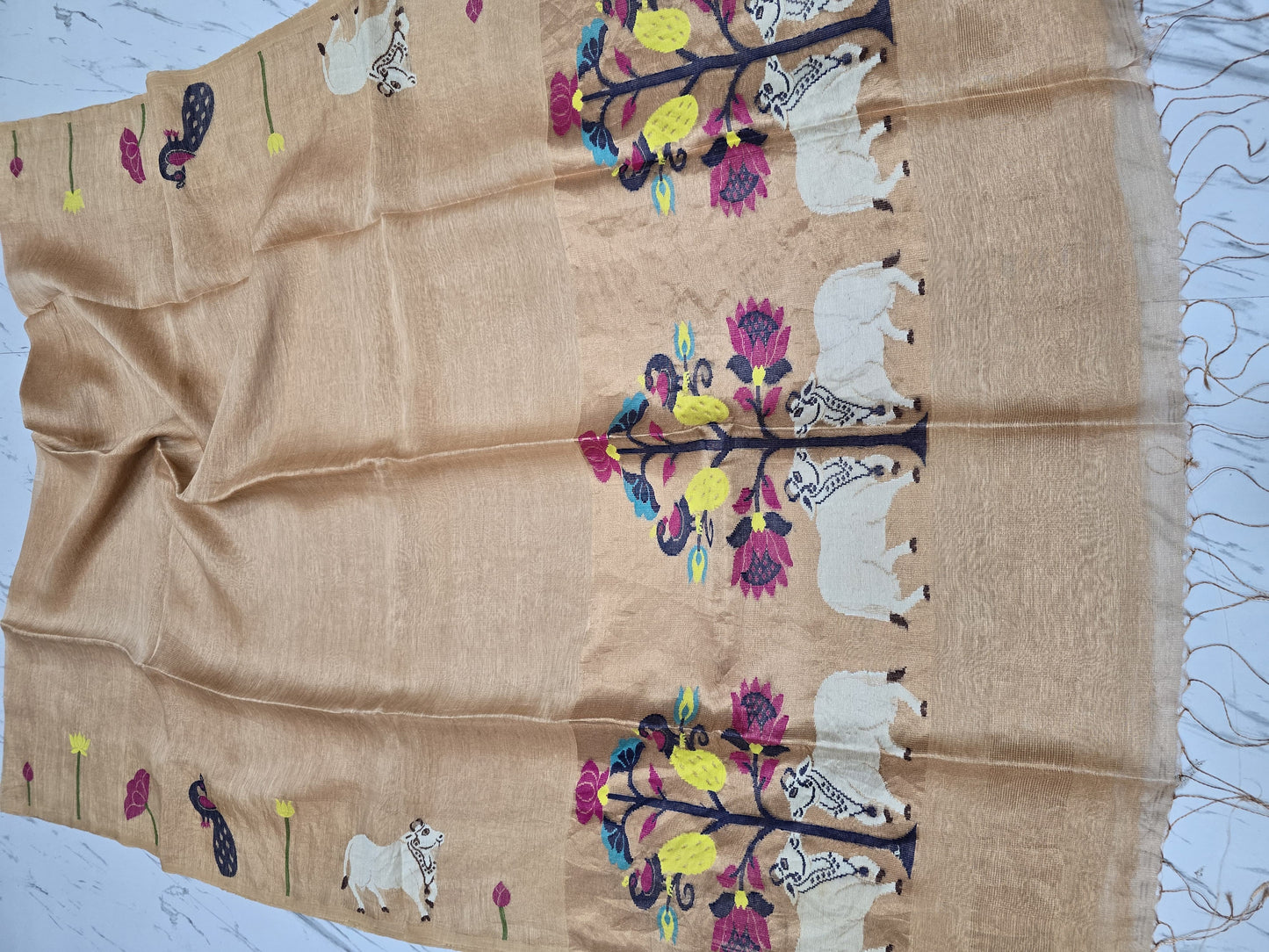 Suravi Silk Linen Pichwai Inspired Jamdani Saree by Rihyaaz featuring intricate handwoven Pichwai-inspired motifs on premium silk linen fabric, ideal for festive, wedding, and ethnic wear.