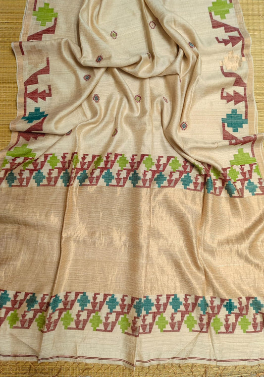 Handwoven Tussar Needle Jamdani saree by Rihyaaz featuring intricate woven motifs, premium Tussar silk fabric, elegant drape, and authentic Bengal craftsmanship for festive and wedding wear.