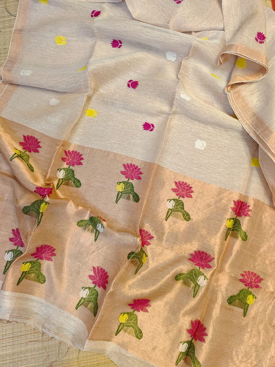 Beige fabric with floral patterns on a beige background