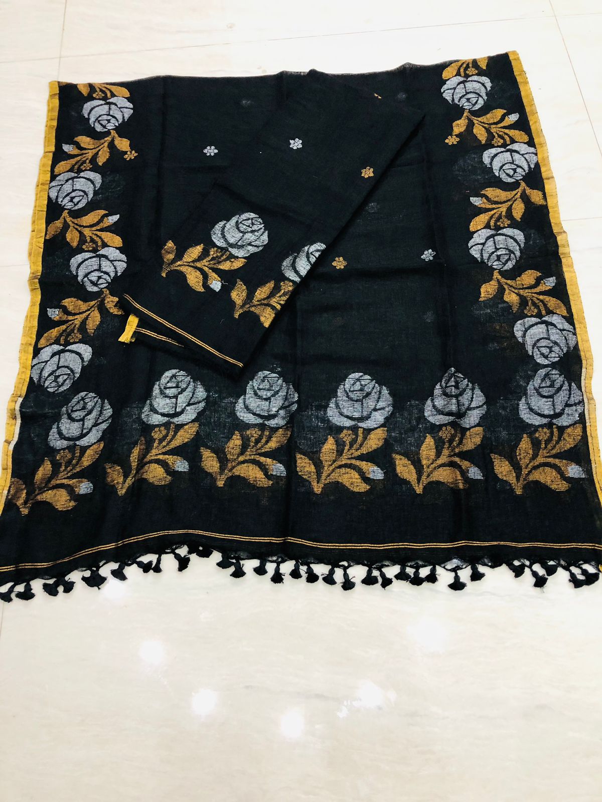 Rose handwoven Jamdani weave suit by Rihyaaz Fashions, showcasing traditional Indian handloom craftsmanship and elegant ethnic design.
