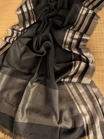 Black Pure 100-count Jayashree linen saree with tested zari double border on both sides and zari palla, including running blouse piece from Rihyaaz Fashions.