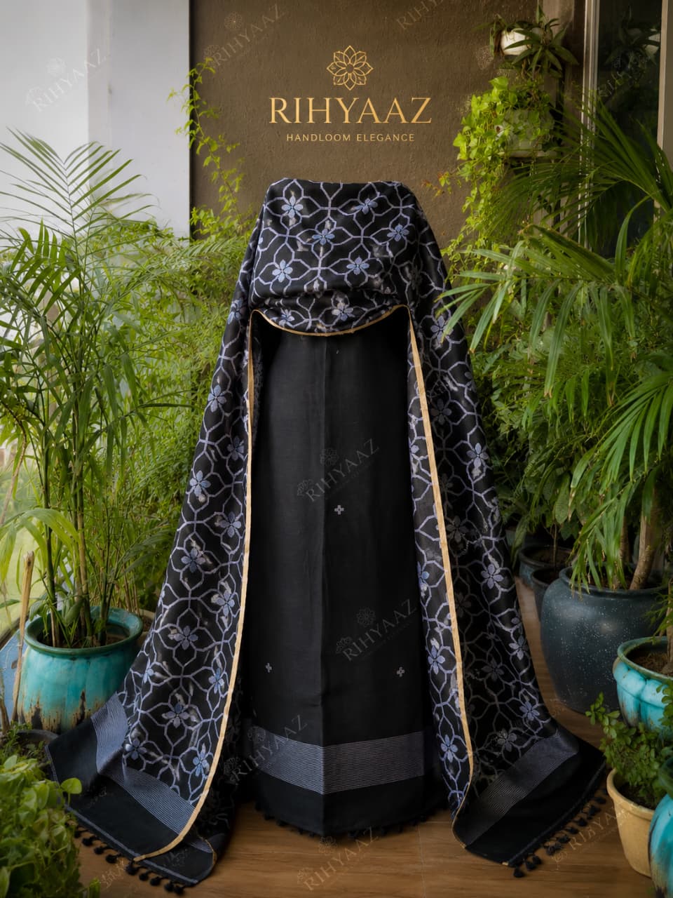 Zohra pure linen polka weaved suit with an all-over woven floral dupatta by  Rihyaaz for a graceful elegant look.