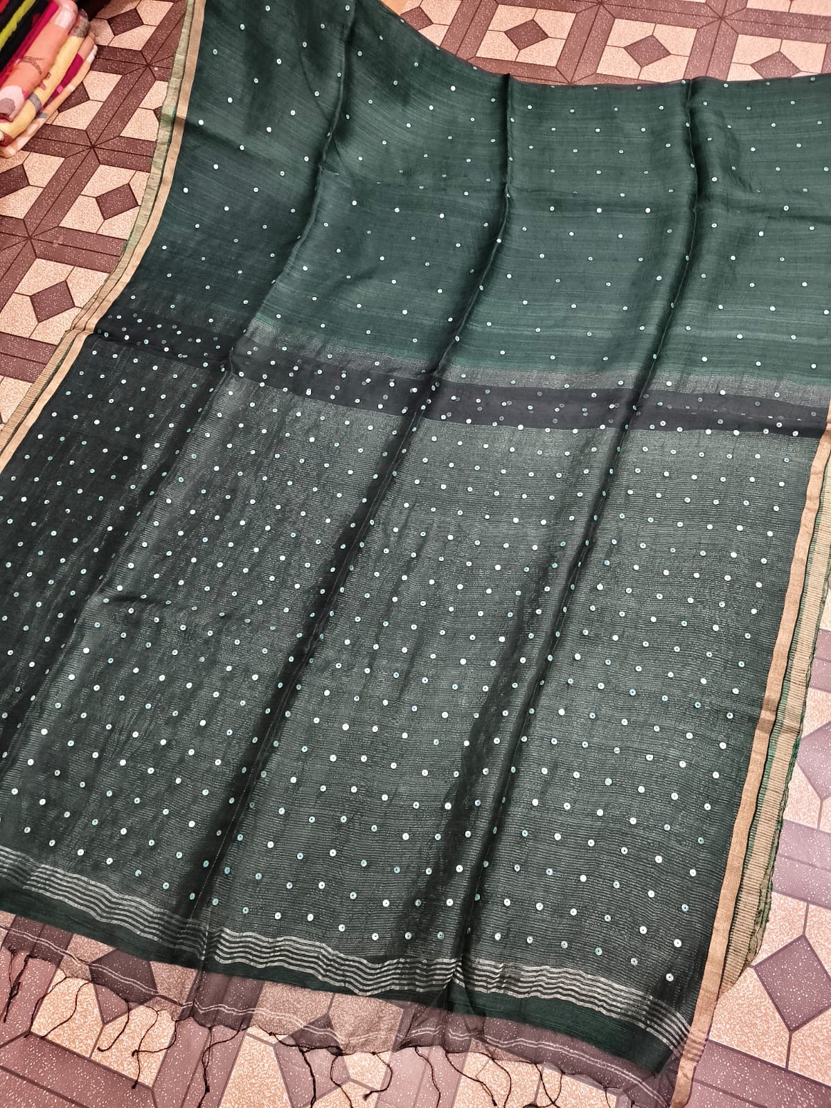 Shatranj Pure Matka Muslin Silk saree with zari border and all-over white sequin sea-shell woven palla, paired with running Matka blouse piece by Rihyaaz 