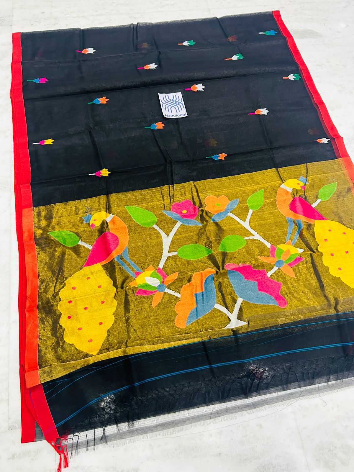 Shahi pure muslin handwoven saree with blouse piece by Rihyaaz, showcasing traditional Indian handloom craftsmanship and elegant woven texture.