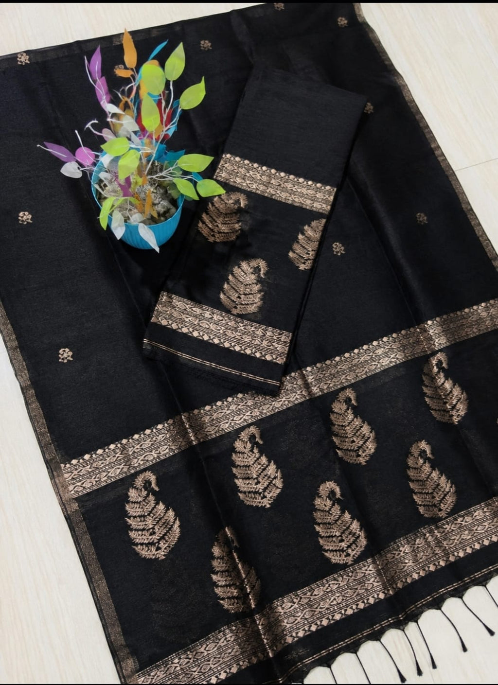 Kairi black Pure Silk Linen Jamdani suit with handwoven detailing and net tassel dupatta by Rihyaaz