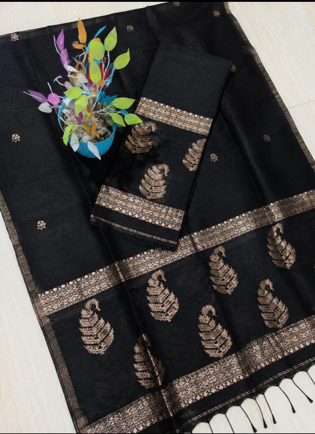 Kairi black Pure Silk Linen Jamdani suit with handwoven detailing and net tassel dupatta by Rihyaaz