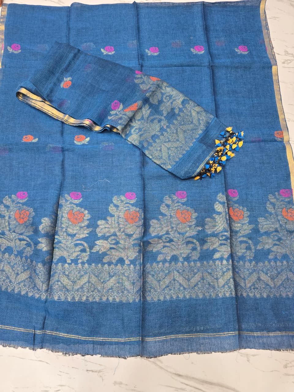 Linen zari weaved Jamdani suit with dupatta by Rihyaaz, showcasing elegant handwoven traditional craftsmanship and contemporary ethnic styling.
