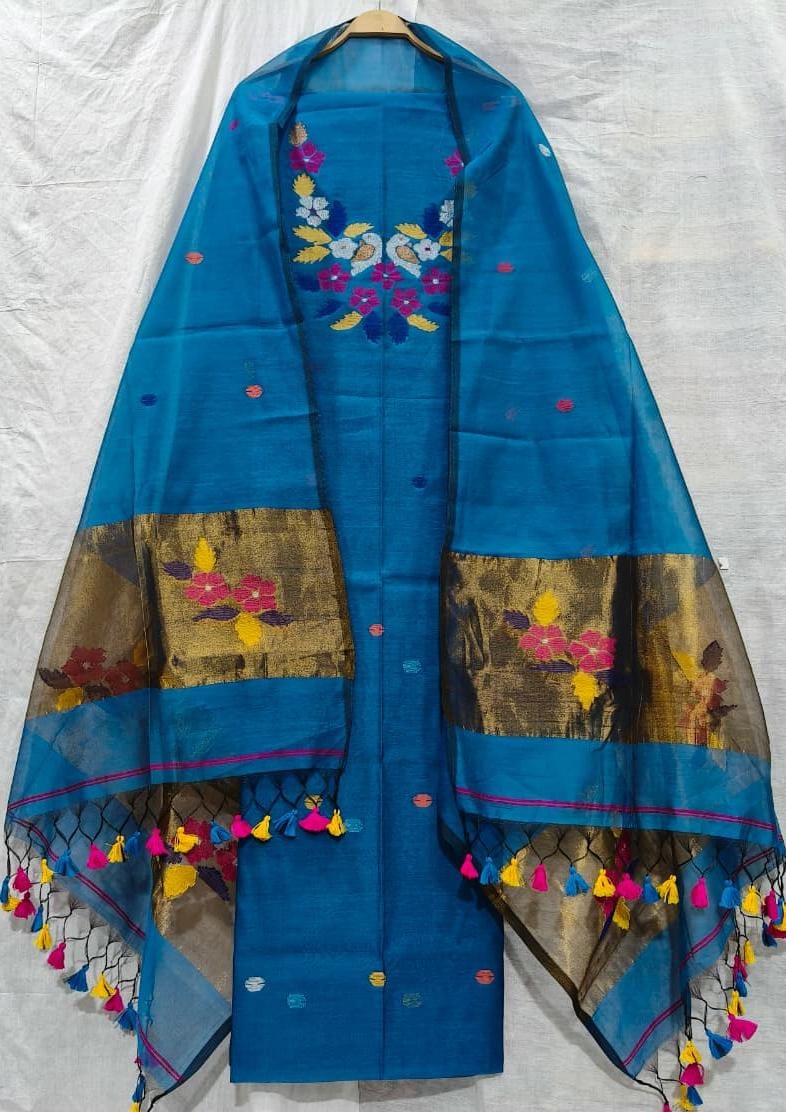 Rihyaaz Muslin Jamdani suit with matching tassel dupatta and delicate needle-weaved floral motifs.