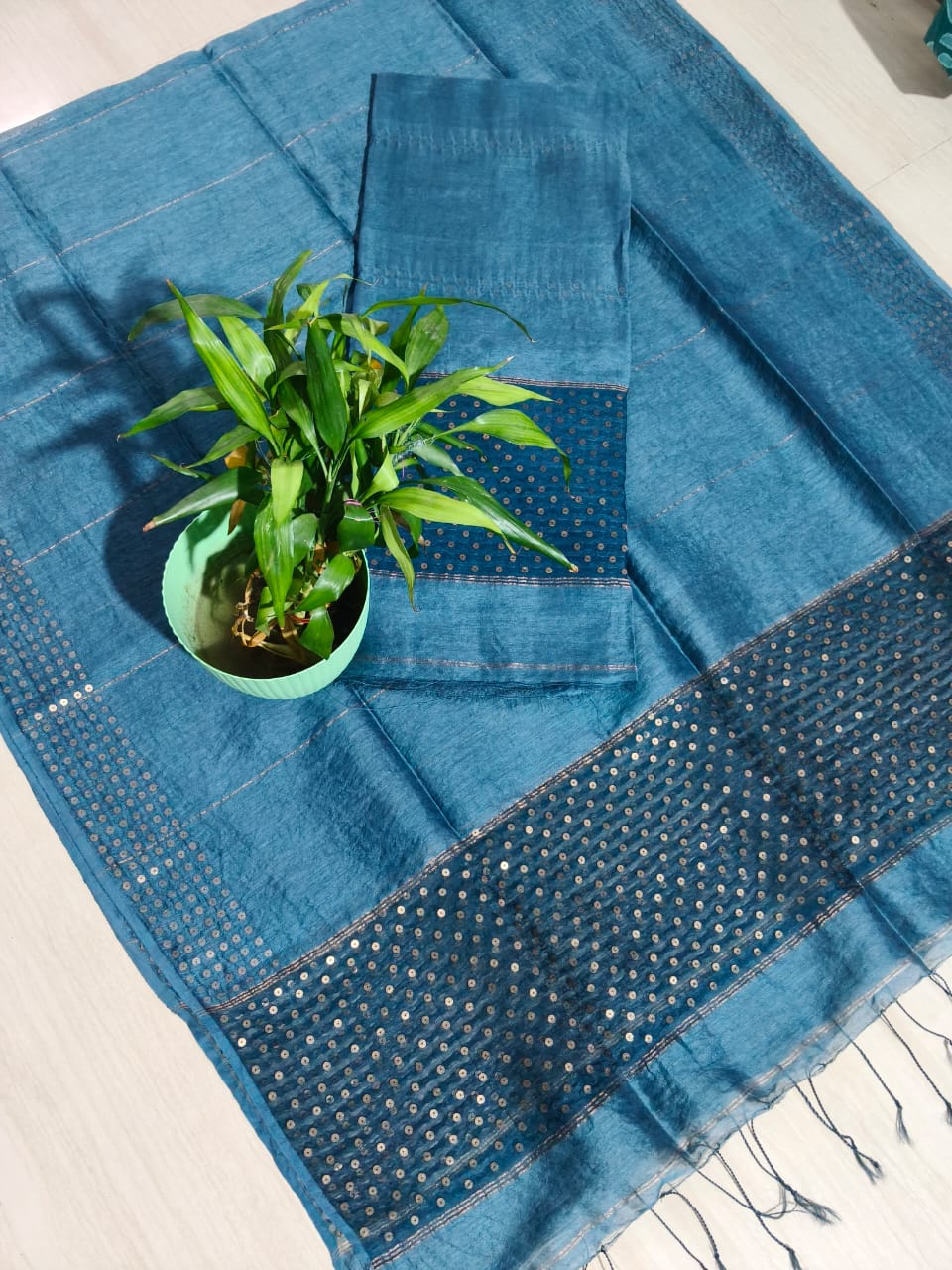 Ira new handwoven Silk Linen Jamdani suit set with 3 meter top and 2.5 meter dupatta featuring elegant net tassel detailing by Rihyaaz.
