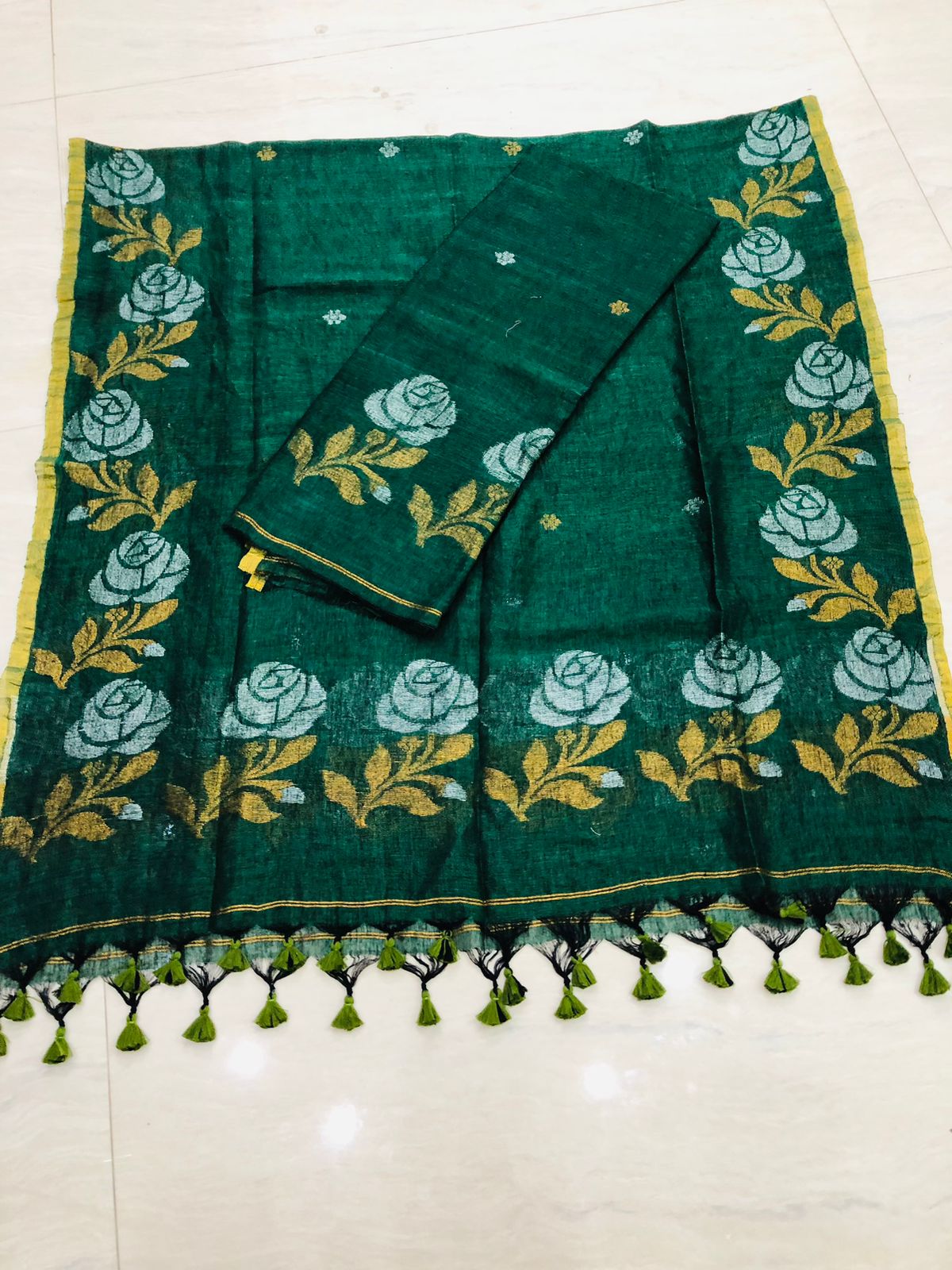 Rose handwoven Jamdani weave suit by Rihyaaz Fashions, showcasing traditional Indian handloom craftsmanship and elegant ethnic design.
