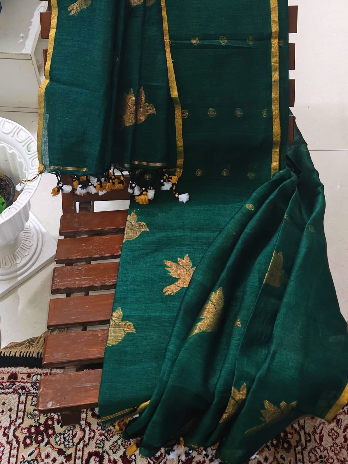 Chorui silk linen zari-weaved suit featuring intricate traditional bird motifs with a 2.5-meter top and 2.5-meter dupatta by Rihyaaz.