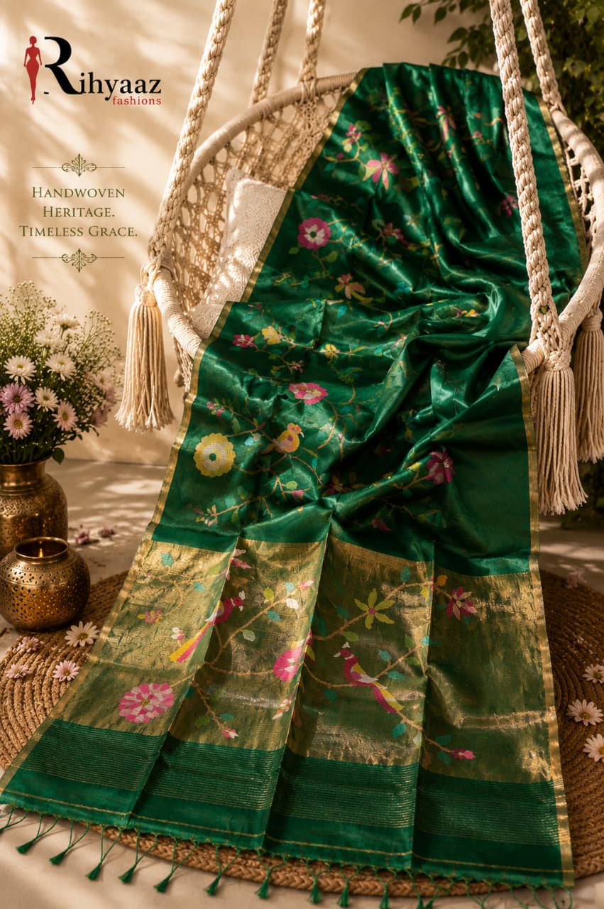 Anushua bottle Green Muslin Silk Paithani Palla Jamdani saree with intricate floral and bird weave by Rihyaaz.