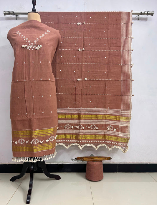 Fumka - handwoven Kapas Bhujodi 3 piece suit set with intricate mirror detailing, artisan woven kurta, matching bottoms and dupatta by Rihyaaz in sustainable handcrafted ethnic wear.