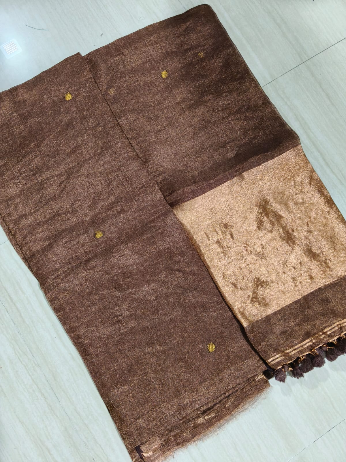 Premium silk tissue linen suit set with broad zari palla dupatta in elegant festive ethnic wear for women.