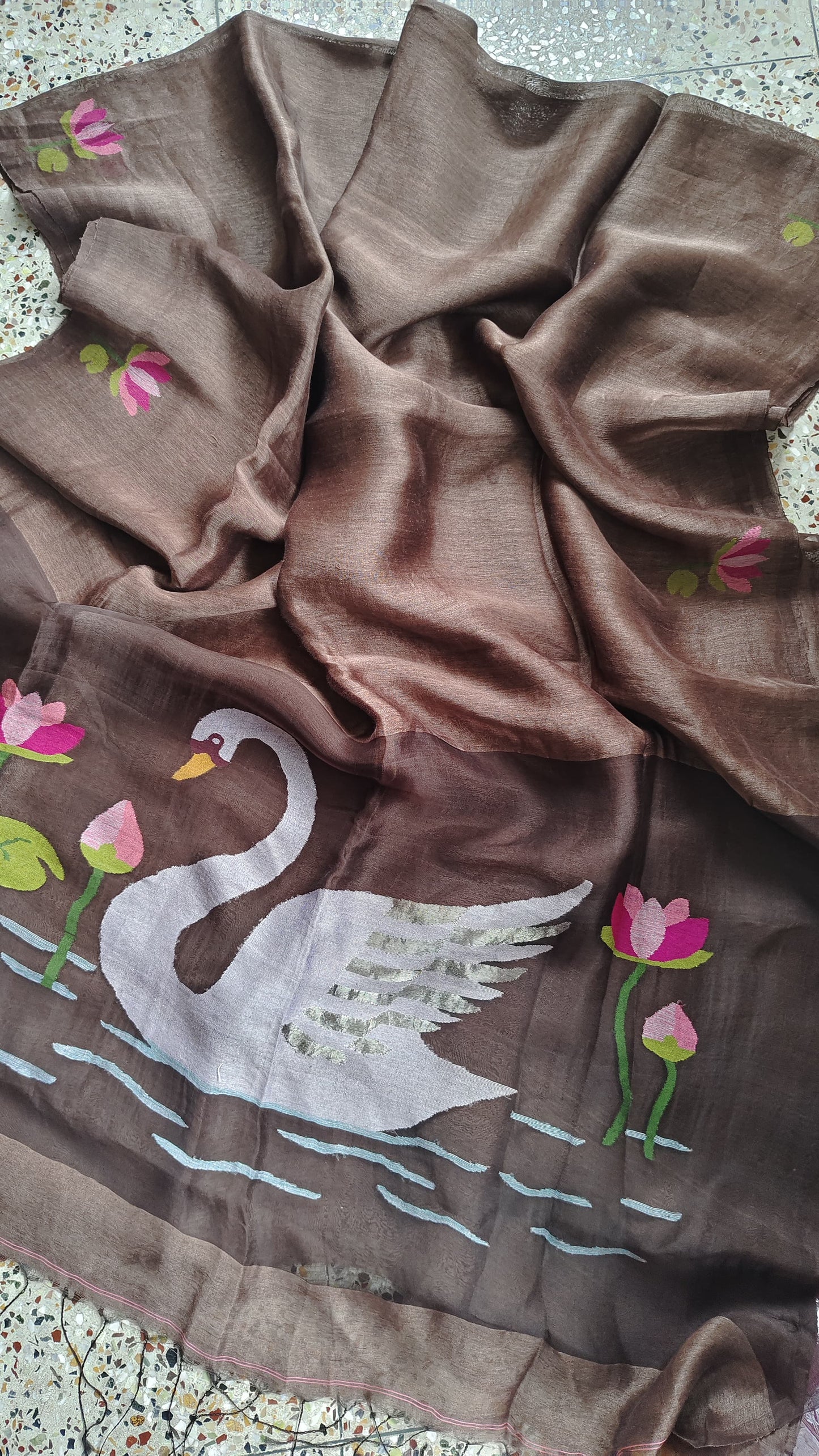Pure Jayashree linen silk saree with handwoven needlework resham palla with delicate lotus and swan motifs and running blouse piece by Rihyaaz.