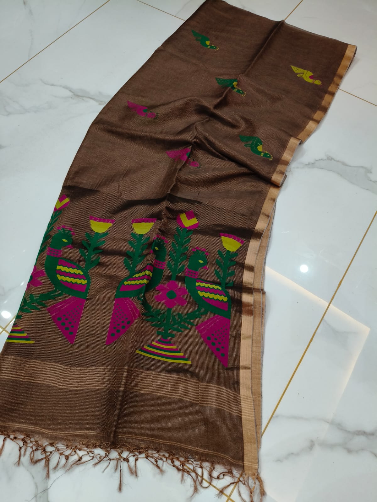 Mayur brown pure Jayasree linen tissue saree with pure tested zari and Paithani Jamdani work, featuring a running blouse piece by Rihyaaz.