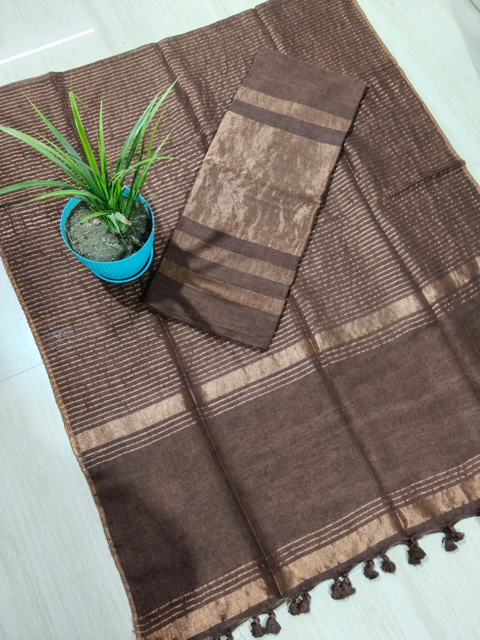 Soiree - premium silk linen zari weaved suit by Rihyaaz featuring intricate zari woven detailing and a luxurious zari dupatta for festive, wedding, and occasion wear.