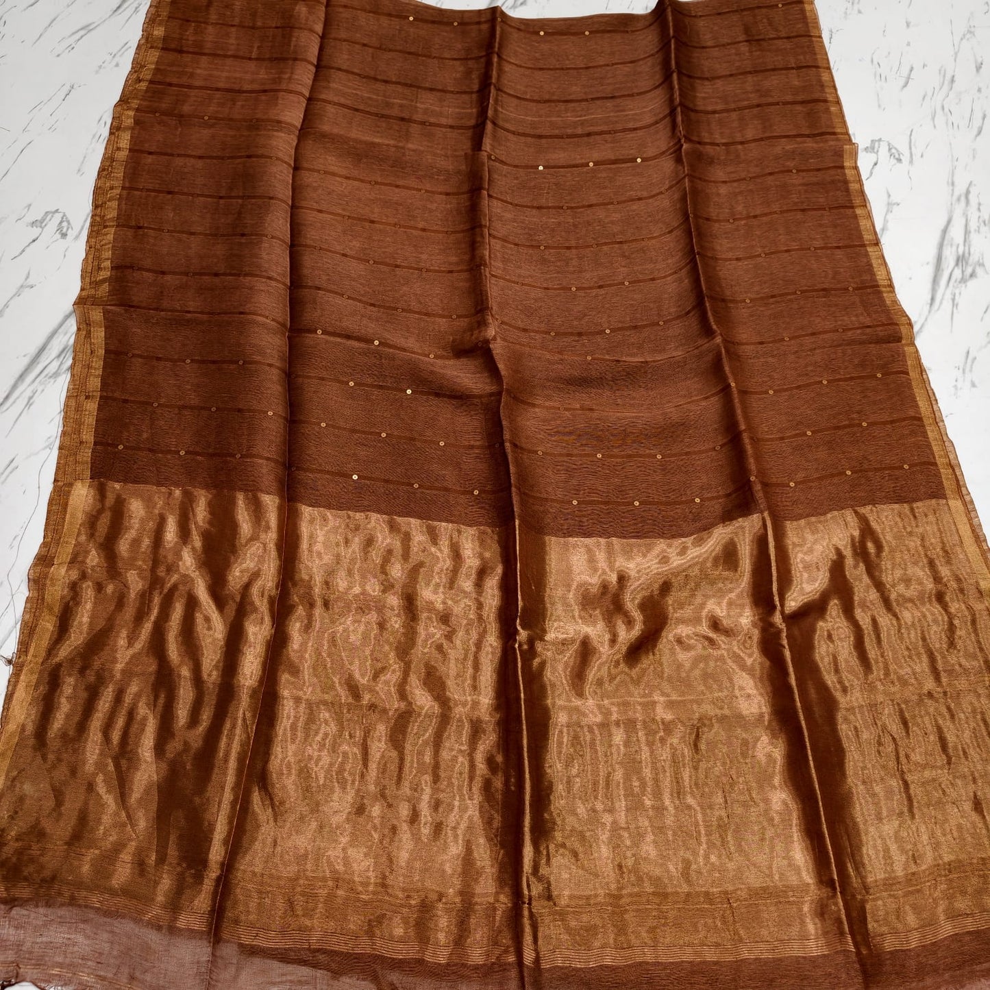 Nakshi Tissue Palla Resham Sequin Weaved Matka Saree by Rihyaaz, featuring elegant traditional weaving and luxurious tissue palla detailing.