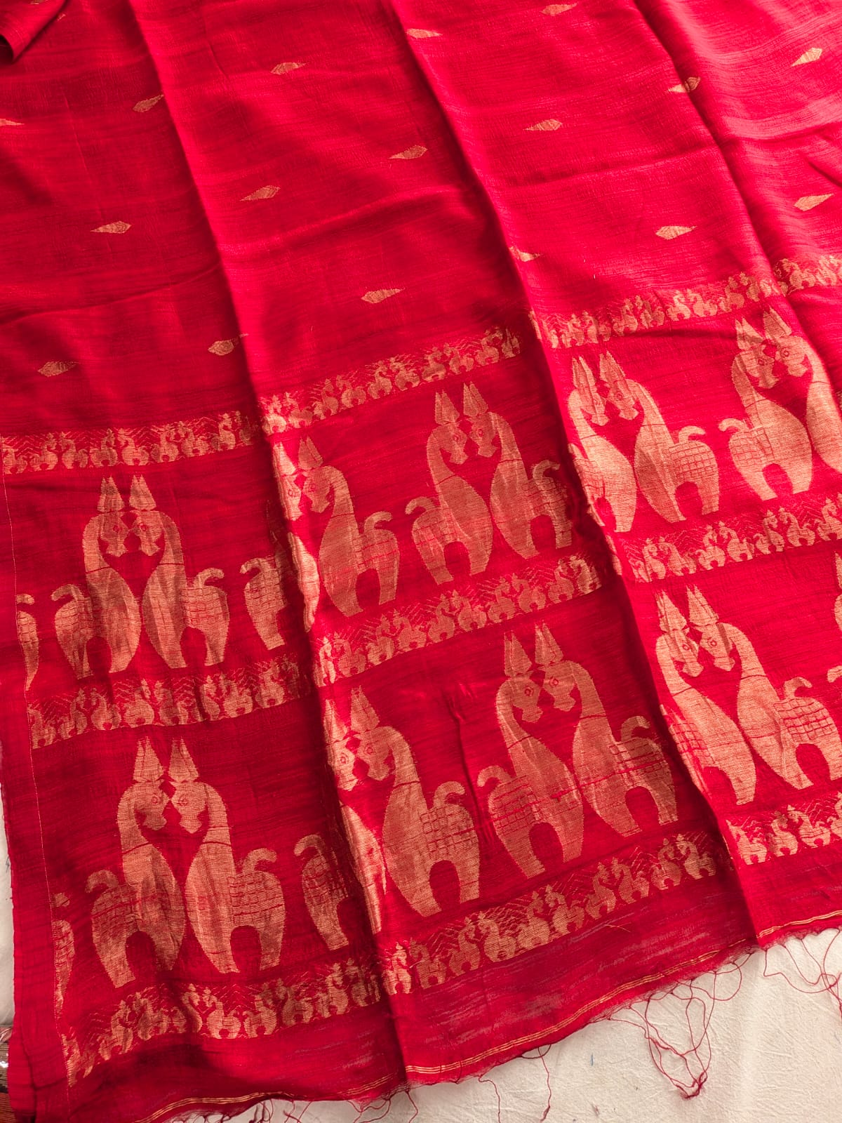 Durga Red premium-quality Pure Matka Jamdani saree with traditional woven designs and running Matka blouse piece by Rihyaaz Fashions.