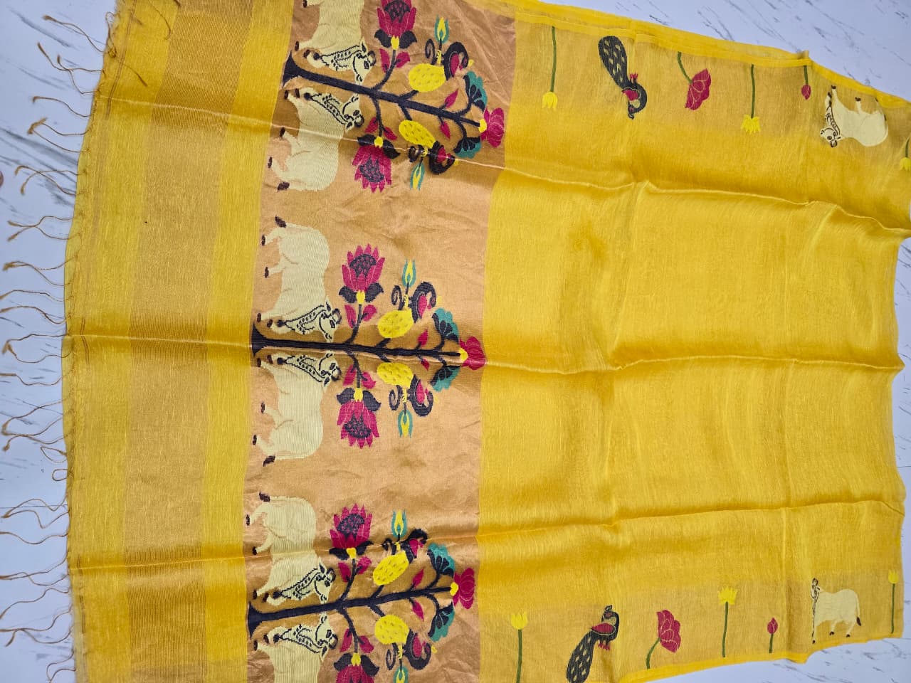 Suravi Silk Linen Pichwai Inspired Jamdani Saree by Rihyaaz featuring intricate handwoven Pichwai-inspired motifs on premium silk linen fabric, ideal for festive, wedding, and ethnic wear.