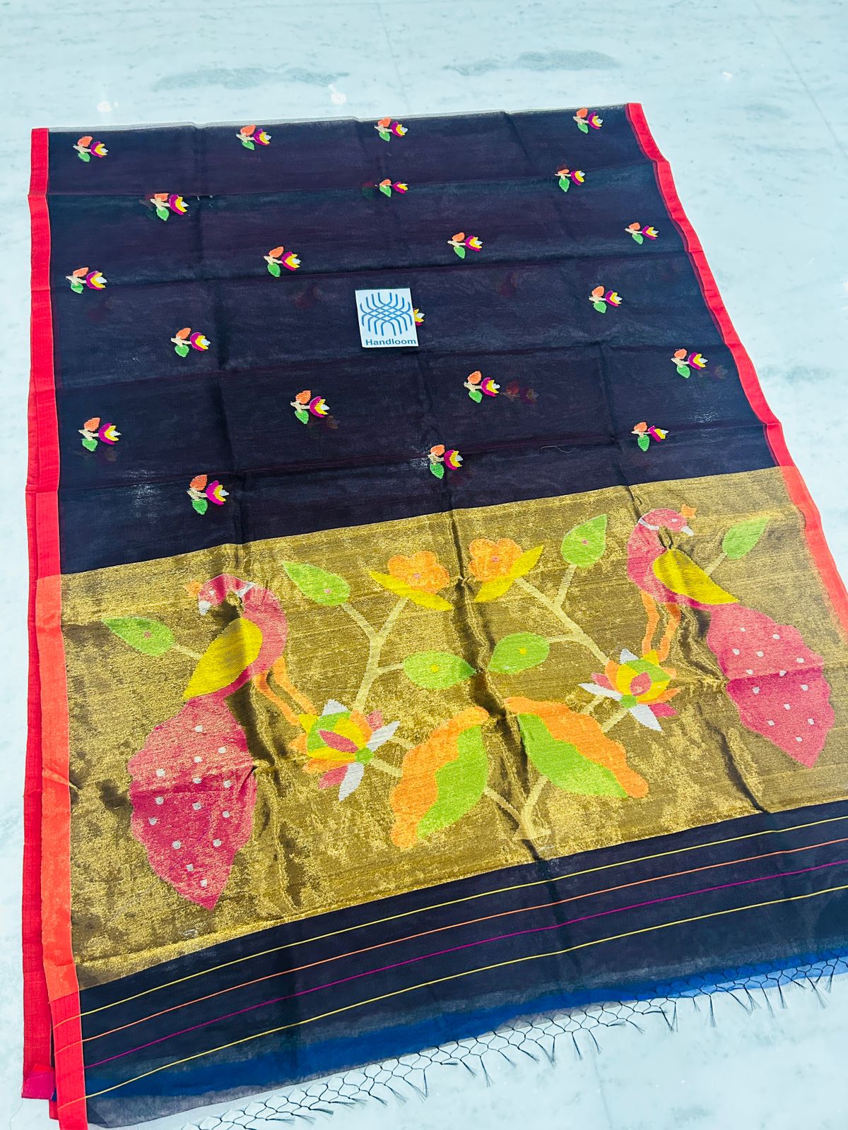 Shahi pure muslin handwoven saree with blouse piece by Rihyaaz, showcasing traditional Indian handloom craftsmanship and elegant woven texture.