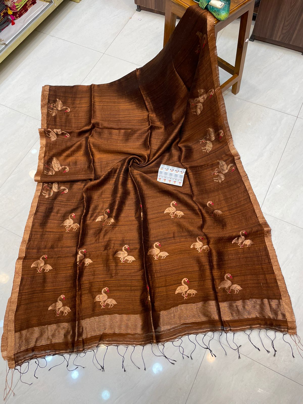 Stork dual zari silk Matka saree by Rihyaaz featuring rich handwoven texture and elegant traditional zari detailing.
