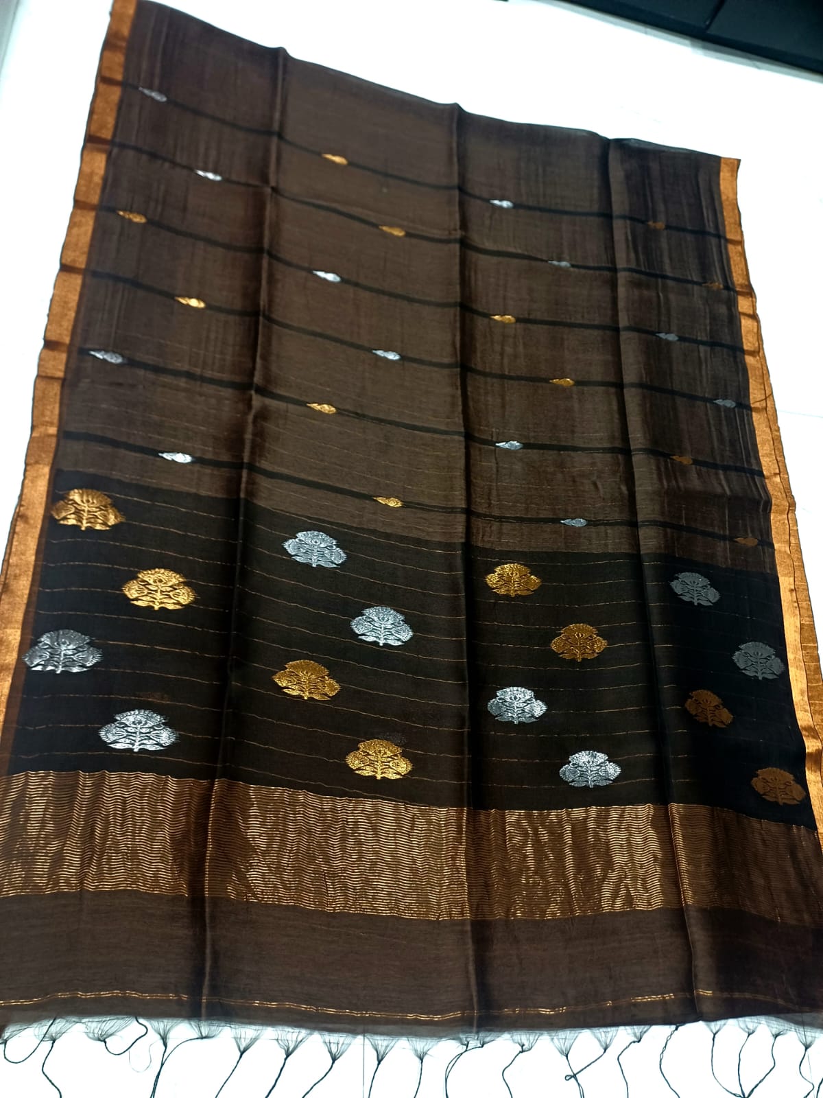 Silkmark Certified Dark Brown Bengal Handloom Tie and Dye Tushar saree with all-over design, contrast border and blouse piece by Rihyaaz.