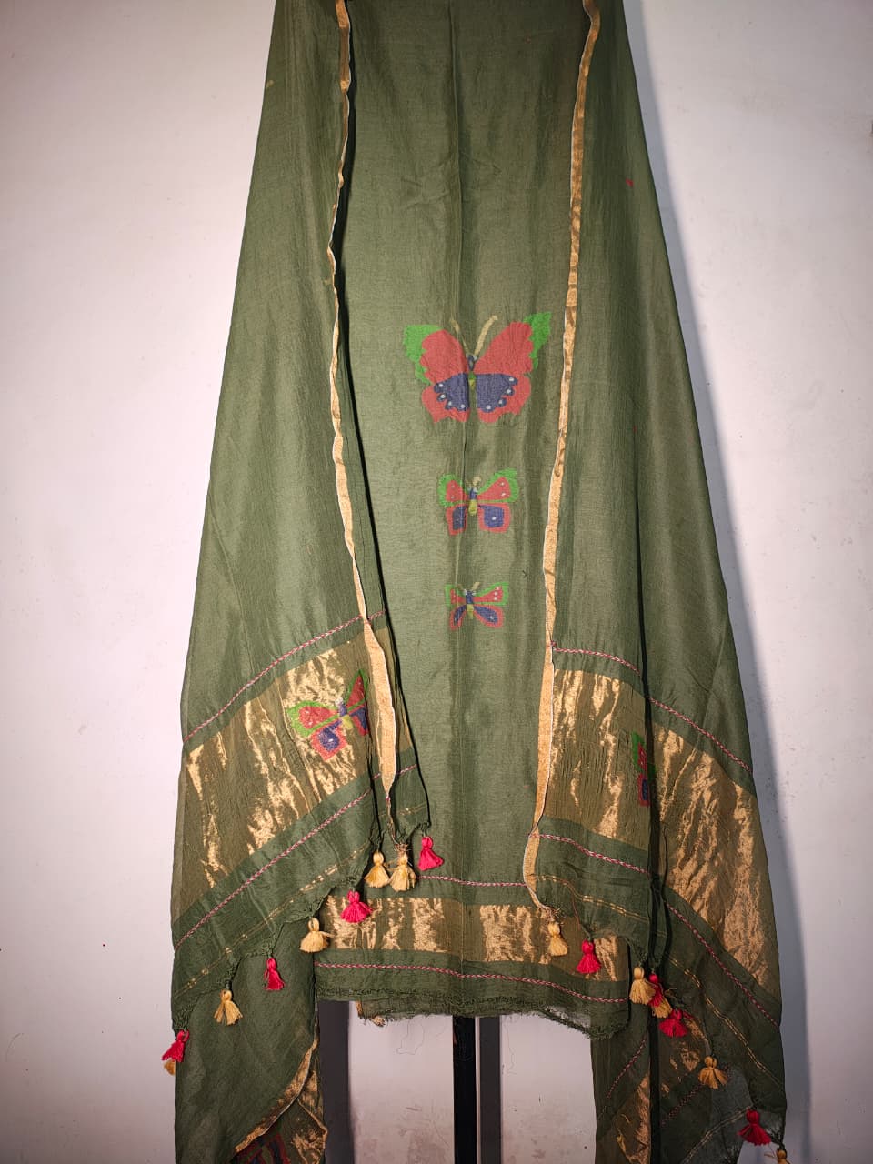 Titli trio zari handwoven Mul Cotton suit with delicate butterfly motifs and elegant zari detailing for a refined royal look by Rihyaaz 