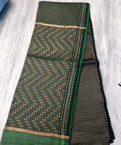 Shama Pure Resham festive saree with dual silver and golden zari stripes, sequin work on palla and border, paired with Pure Matka blouse piece by Rihyaaz.