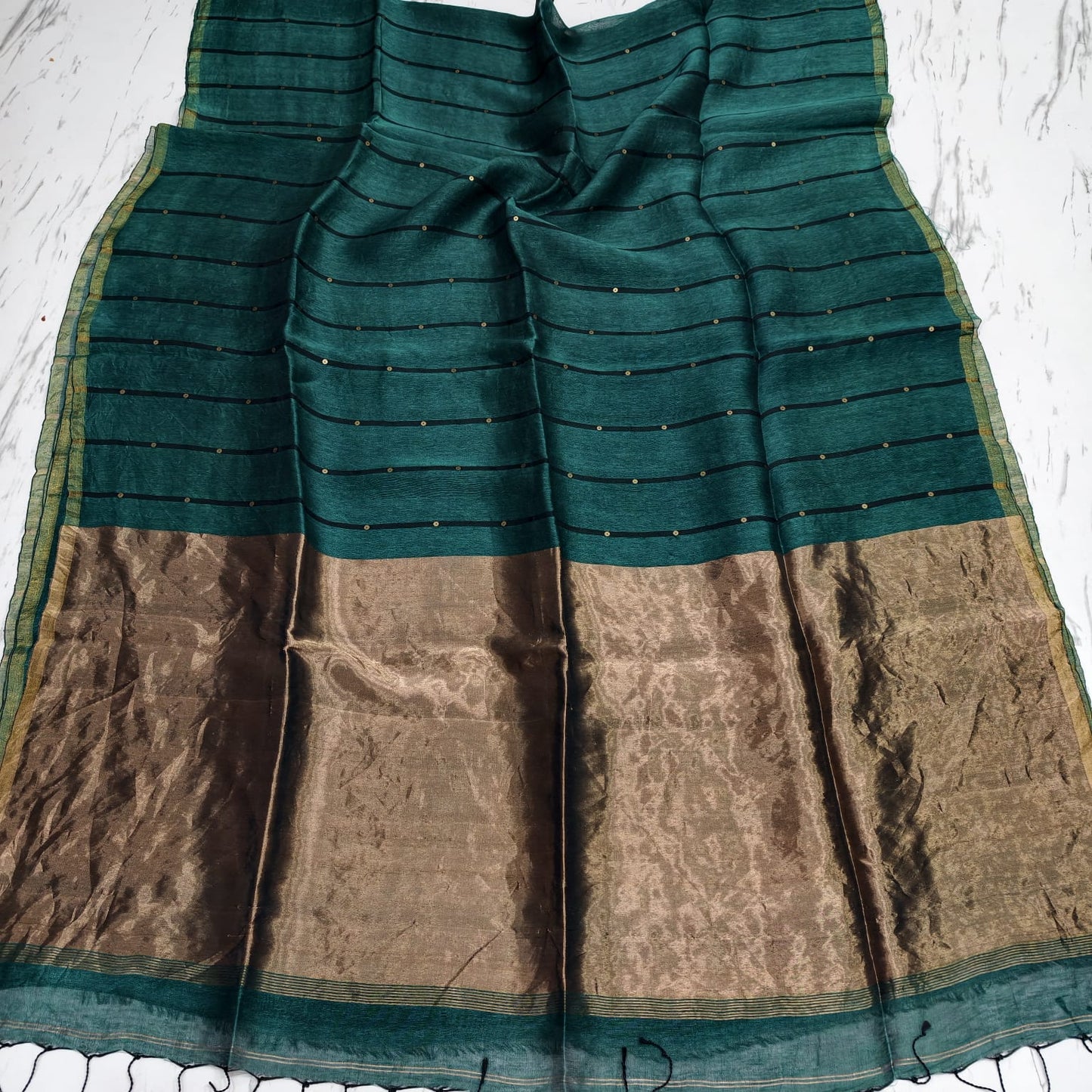 Nakshi Tissue Palla Resham Sequin Weaved Matka Saree by Rihyaaz, featuring elegant traditional weaving and luxurious tissue palla detailing.
