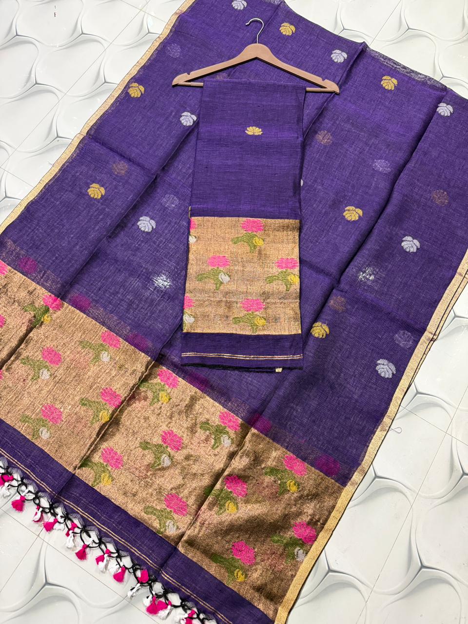 Nusrat Linen Jacquard Palla Jamdani Saree by Rihyaaz featuring an elegant handwoven jacquard palla, premium linen fabric, intricate Jamdani weaving, and a sophisticated traditional design suitable for festive, ethnic, and contemporary occasions.