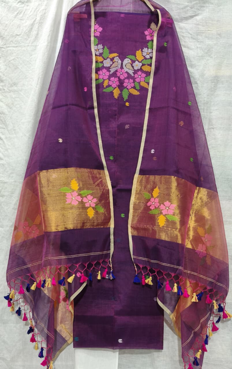 Rihyaaz Muslin Jamdani suit with matching tassel dupatta and delicate needle-weaved floral motifs.