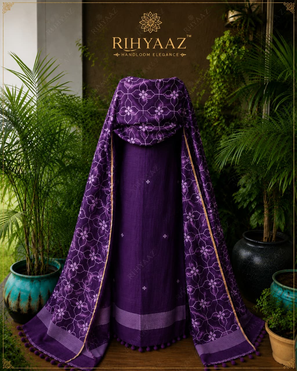 Zohra pure linen polka weaved suit with an all-over woven floral dupatta by  Rihyaaz for a graceful elegant look.