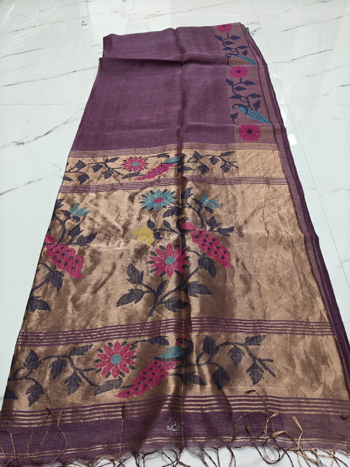 Tarang pure linen tissue Jamdani saree featuring a beautifully detailed needlework Jamdani border with floral and bird motifs, by Rihyaaz.