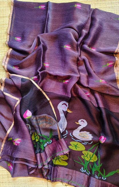 Morali dark purple pure silk Jayshree linen saree with sleek zari border, handwoven Jamdani resham palla and delicate lotus motifs all over the body, with running blouse piece by Rihyaaz Fashions.