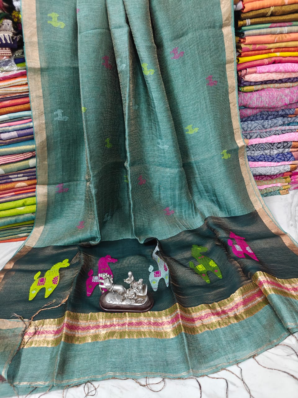 Terracotta Linen Silk Saree with intricate Resham woven palla by Rihyaaz, premium handwoven ethnic saree featuring elegant craftsmanship, soft drape, and timeless festive wear for women
