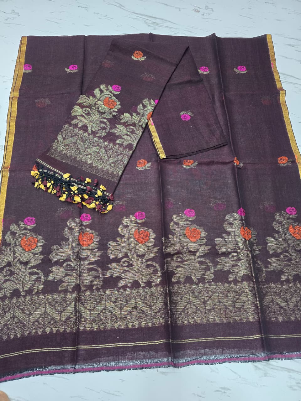 Linen zari weaved Jamdani suit with dupatta by Rihyaaz, showcasing elegant handwoven traditional craftsmanship and contemporary ethnic styling.