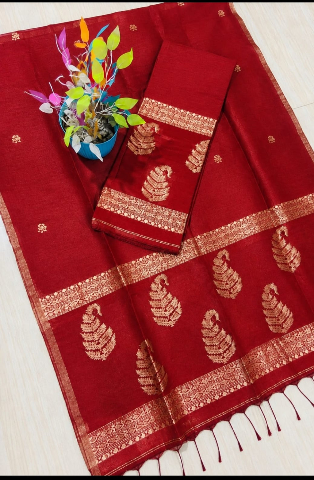 Kairi dark red Pure Silk Linen Jamdani suit with handwoven detailing and net tassel dupatta by Rihyaaz