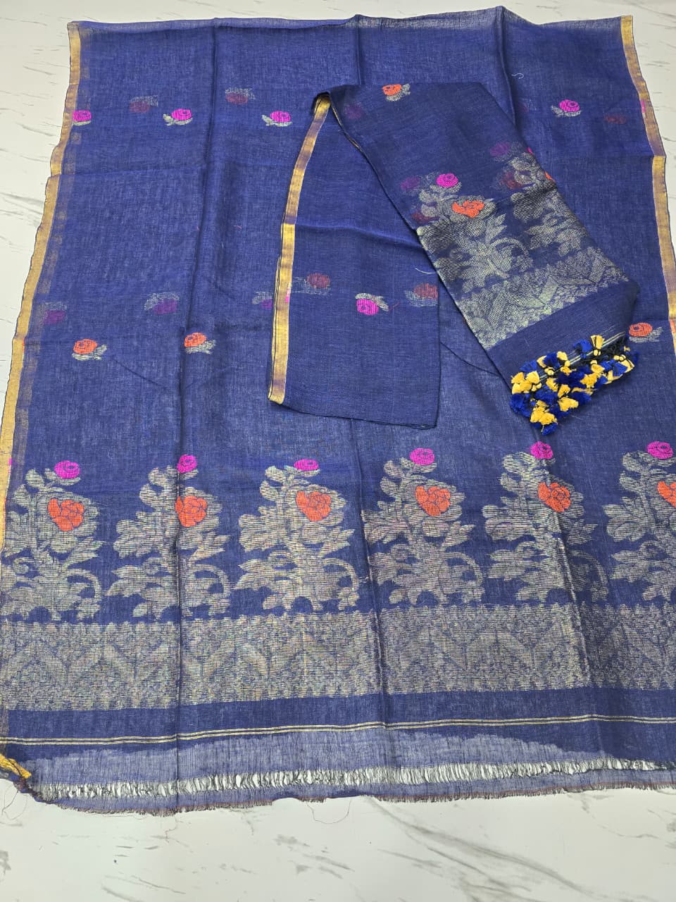 Linen zari weaved Jamdani suit with dupatta by Rihyaaz, showcasing elegant handwoven traditional craftsmanship and contemporary ethnic styling.