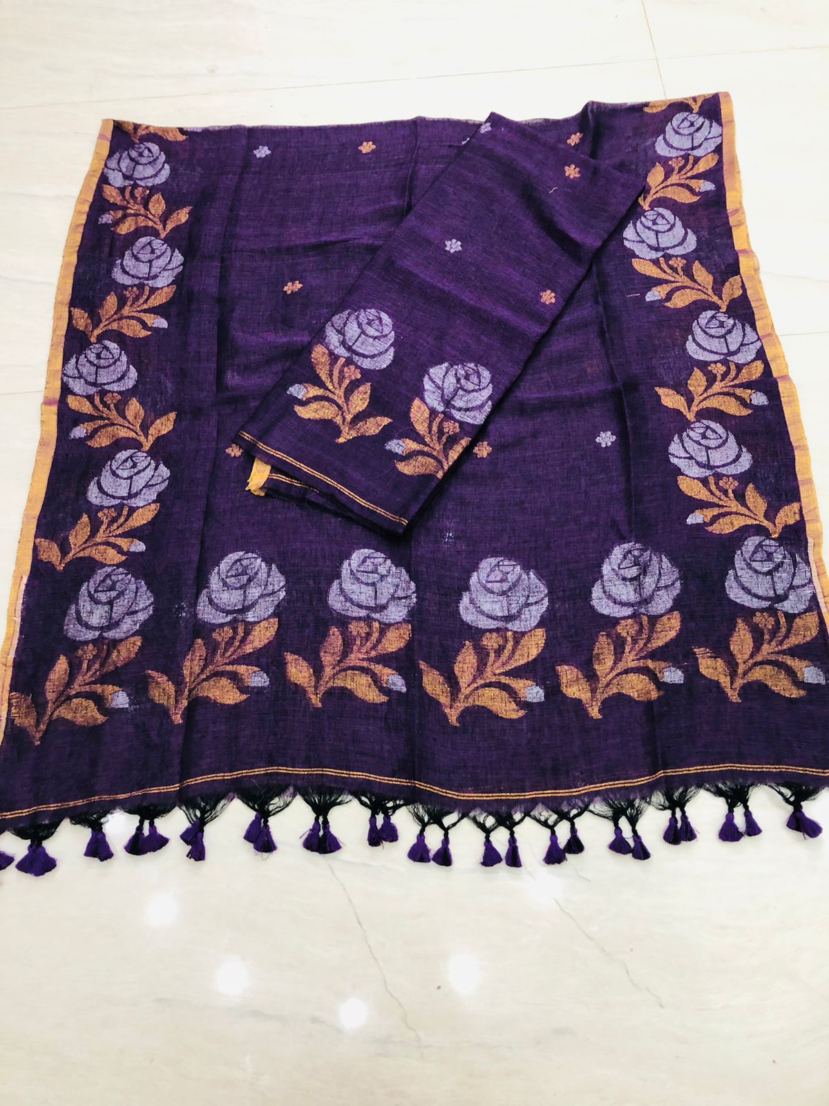 Rose handwoven Jamdani weave suit by Rihyaaz Fashions, showcasing traditional Indian handloom craftsmanship and elegant ethnic design.