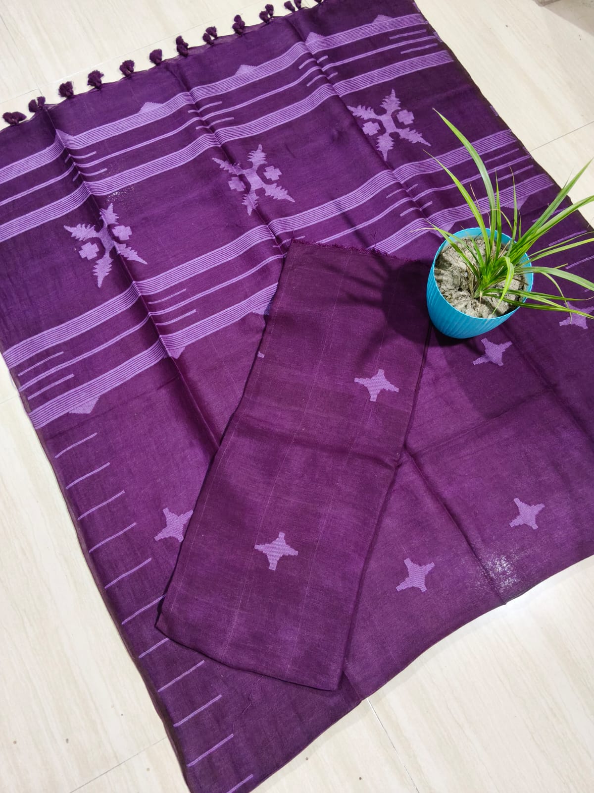 Sparsh linen Jamdani suit with 3-meter top and 2.5-meter tasselled dupatta by Rihyaaz
