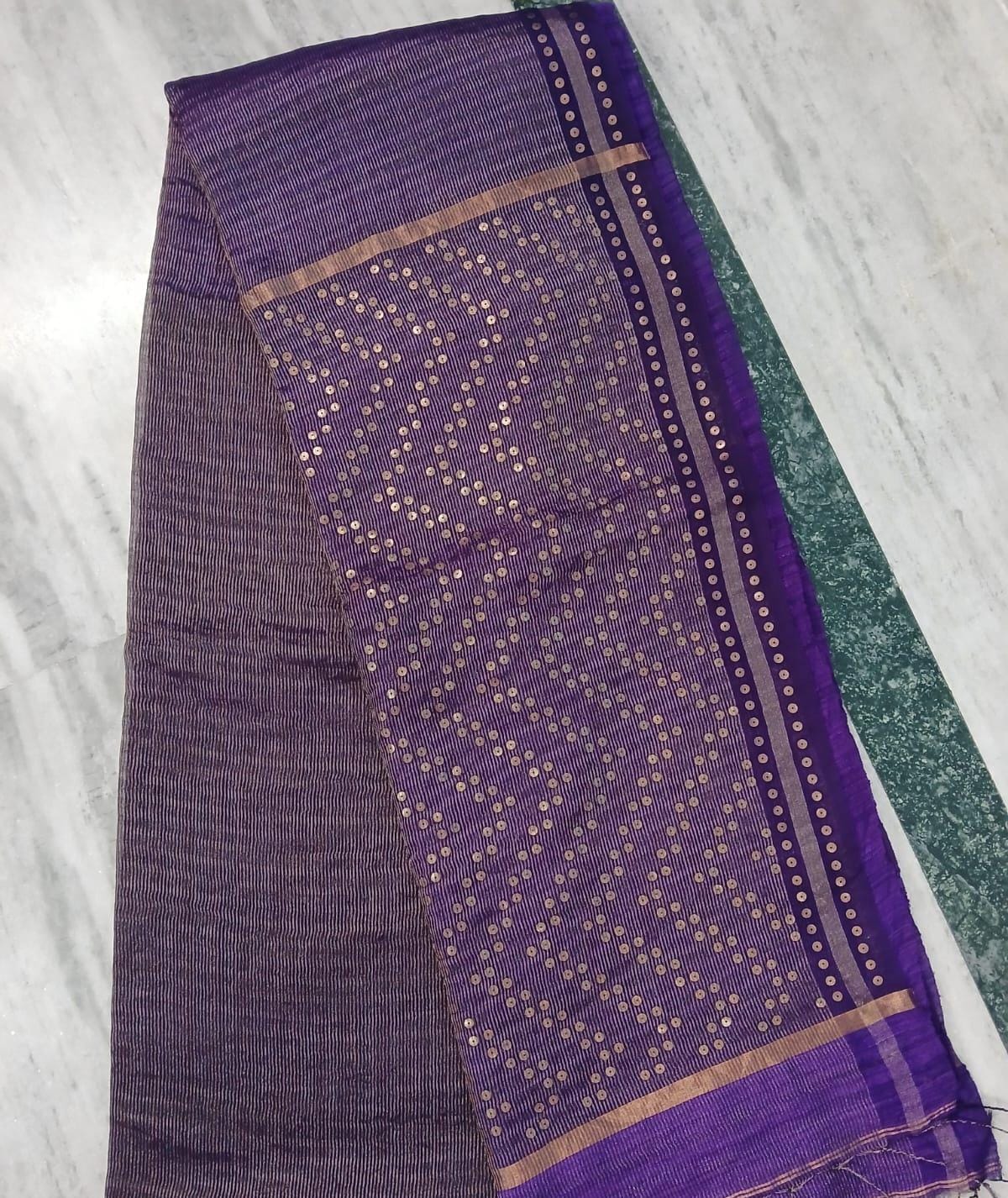 Shama Pure Resham festive saree with dual silver and golden zari stripes, sequin work on palla and border, paired with Pure Matka blouse piece by Rihyaaz.