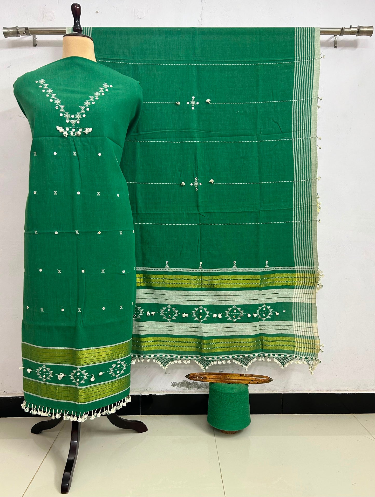 Fumka - handwoven Kapas Bhujodi 3 piece suit set with intricate mirror detailing, artisan woven kurta, matching bottoms and dupatta by Rihyaaz in sustainable handcrafted ethnic wear.