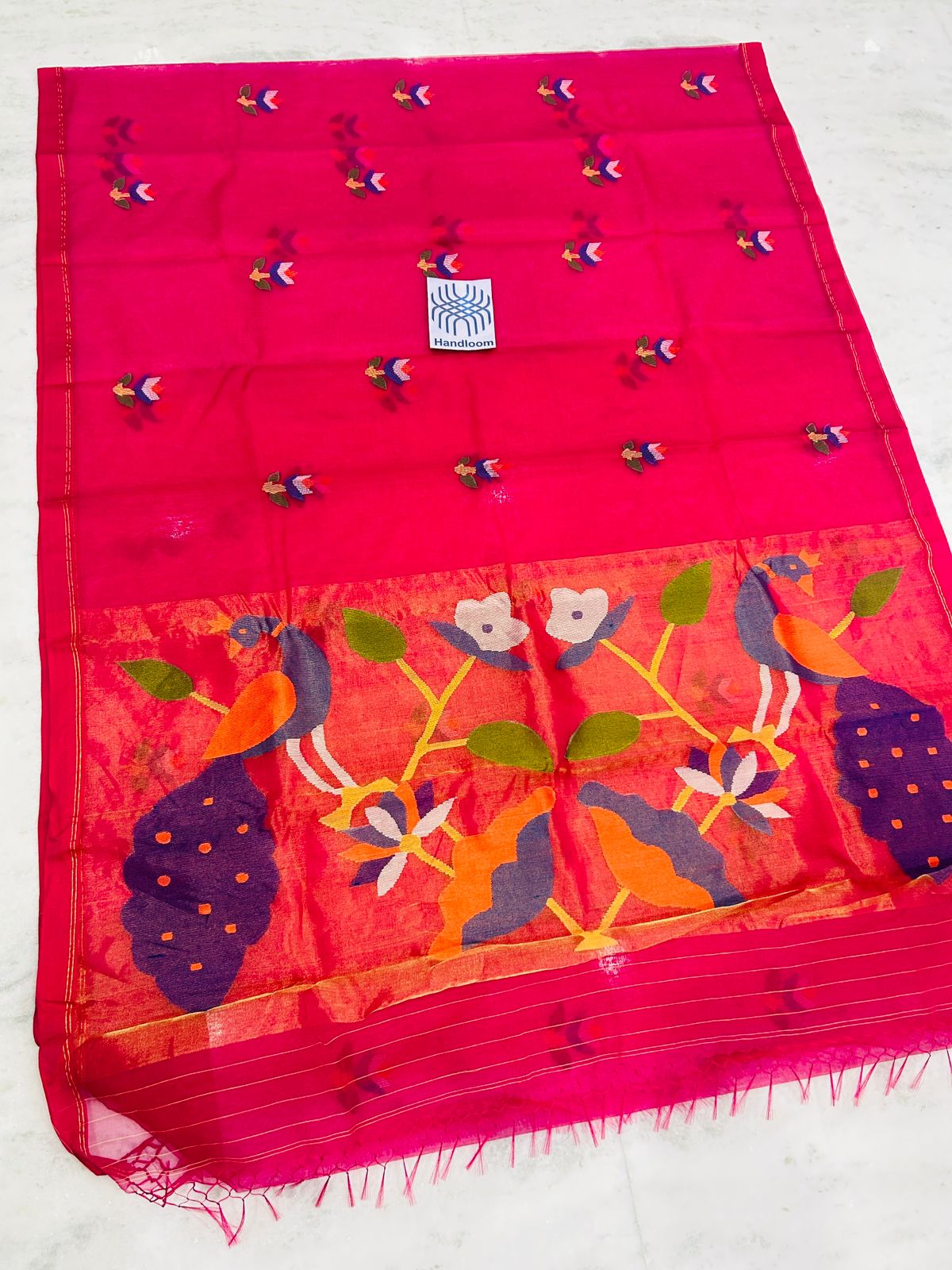 Shahi pure muslin handwoven saree with blouse piece by Rihyaaz, showcasing traditional Indian handloom craftsmanship and elegant woven texture.