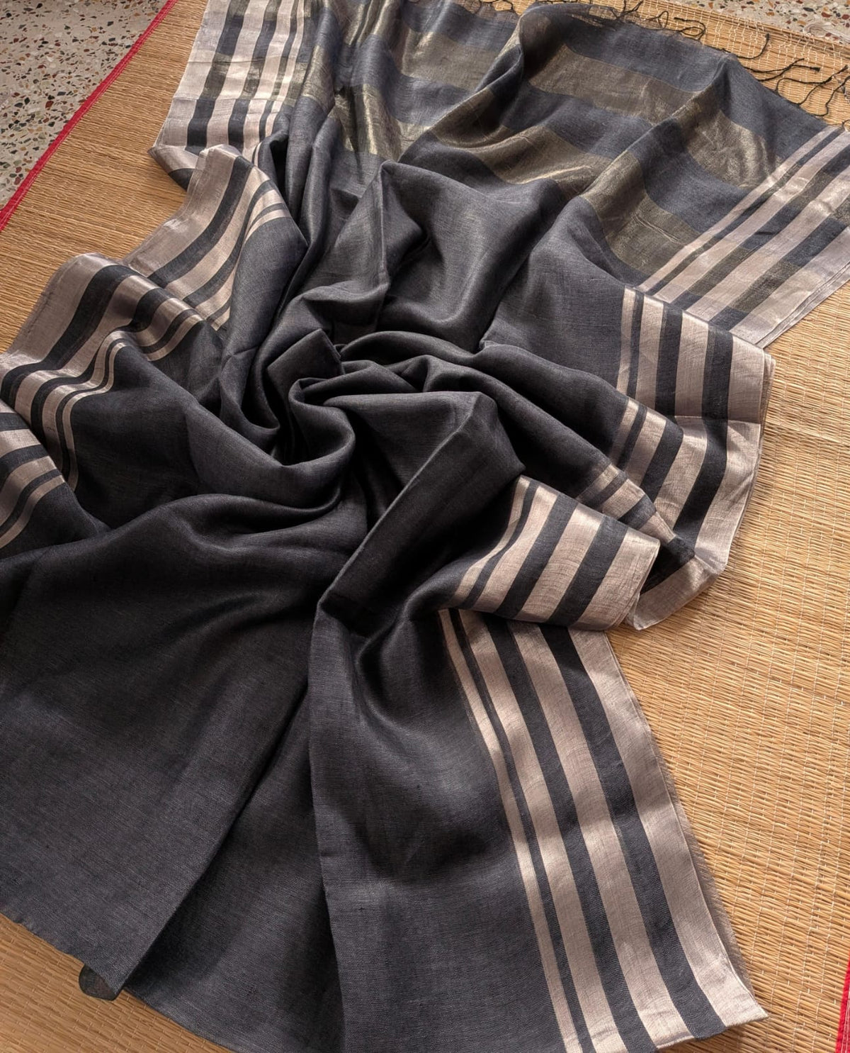 Gray Pure 100-count Jayashree linen saree with tested zari double border on both sides and zari palla, including running blouse piece from Rihyaaz Fashions.